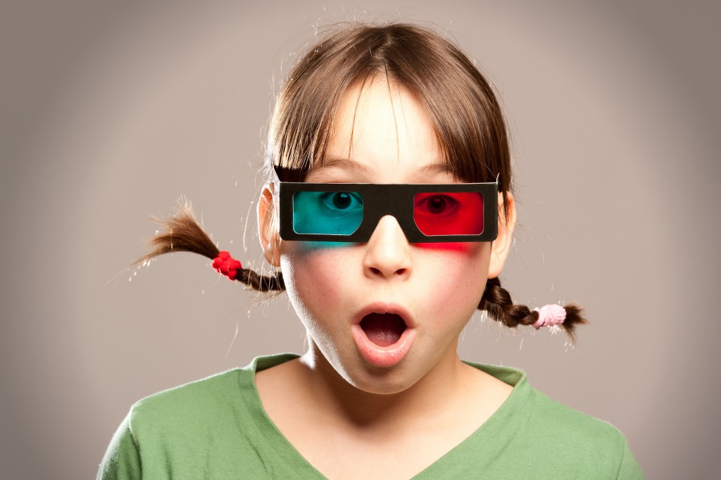 young girl wearing 3d glasses